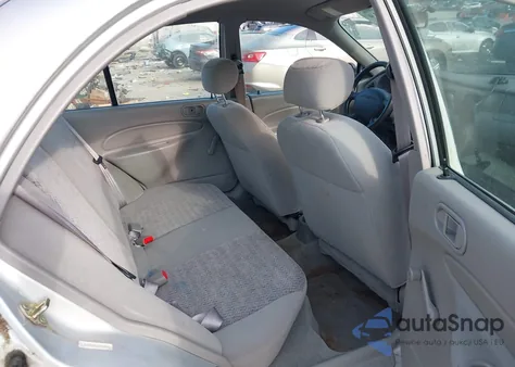 1999 Ford Escort Se z USA, uszkodzony, nr VIN 1FAFP13P6XW200107